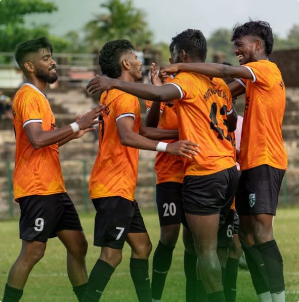 Players celebrating a goal